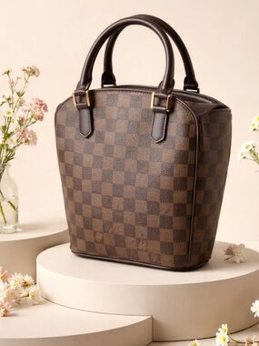 Louis Vuitton GM Sarria Seau Damien Ebene Canvas Handbag.